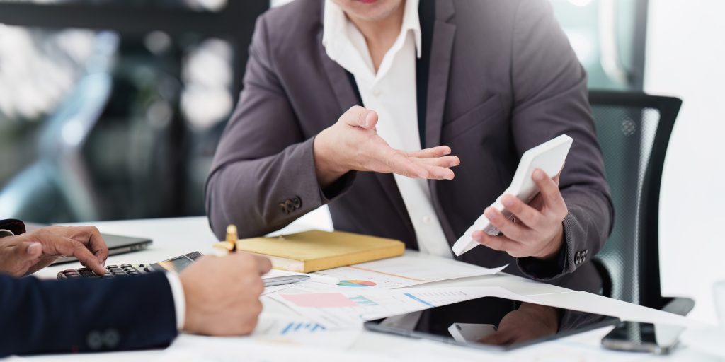Group of Businessman or Accountant checking finance data document for investigation of corruption account. Anti Bribery concept