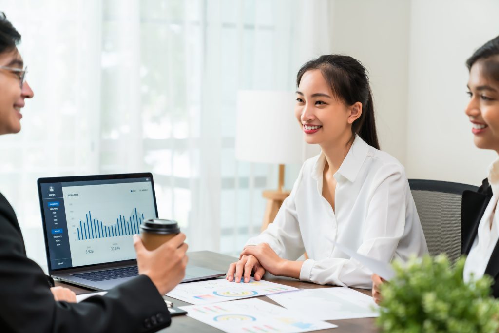 Women discussing credit solutions with clients