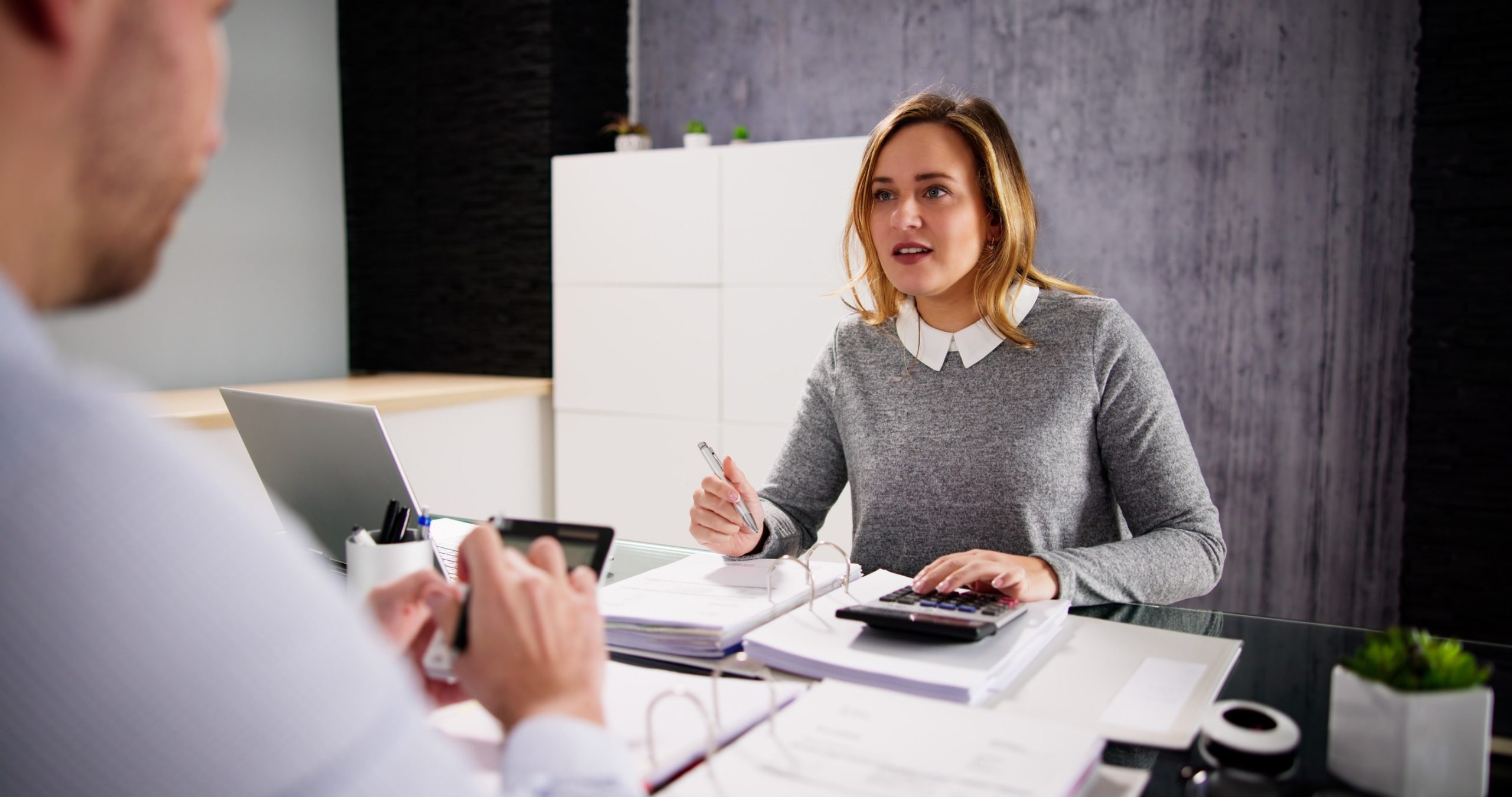 SME cashflow specialist helping a business owner